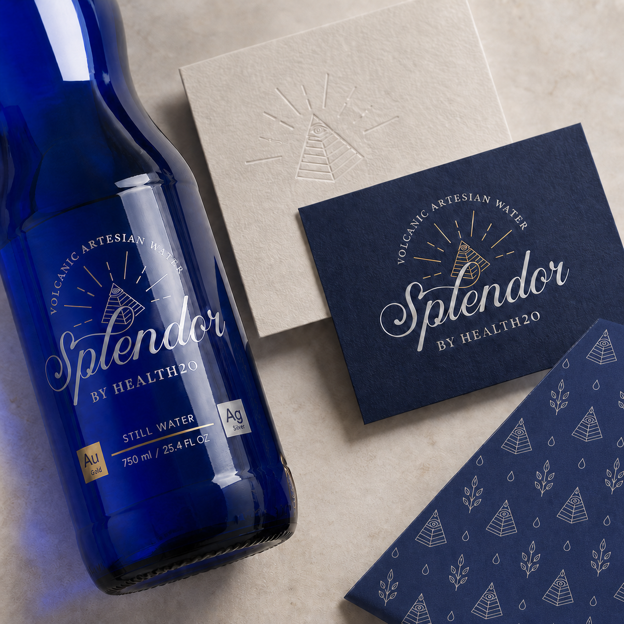 Splendor identity details, glass bottle, and printed brand materials